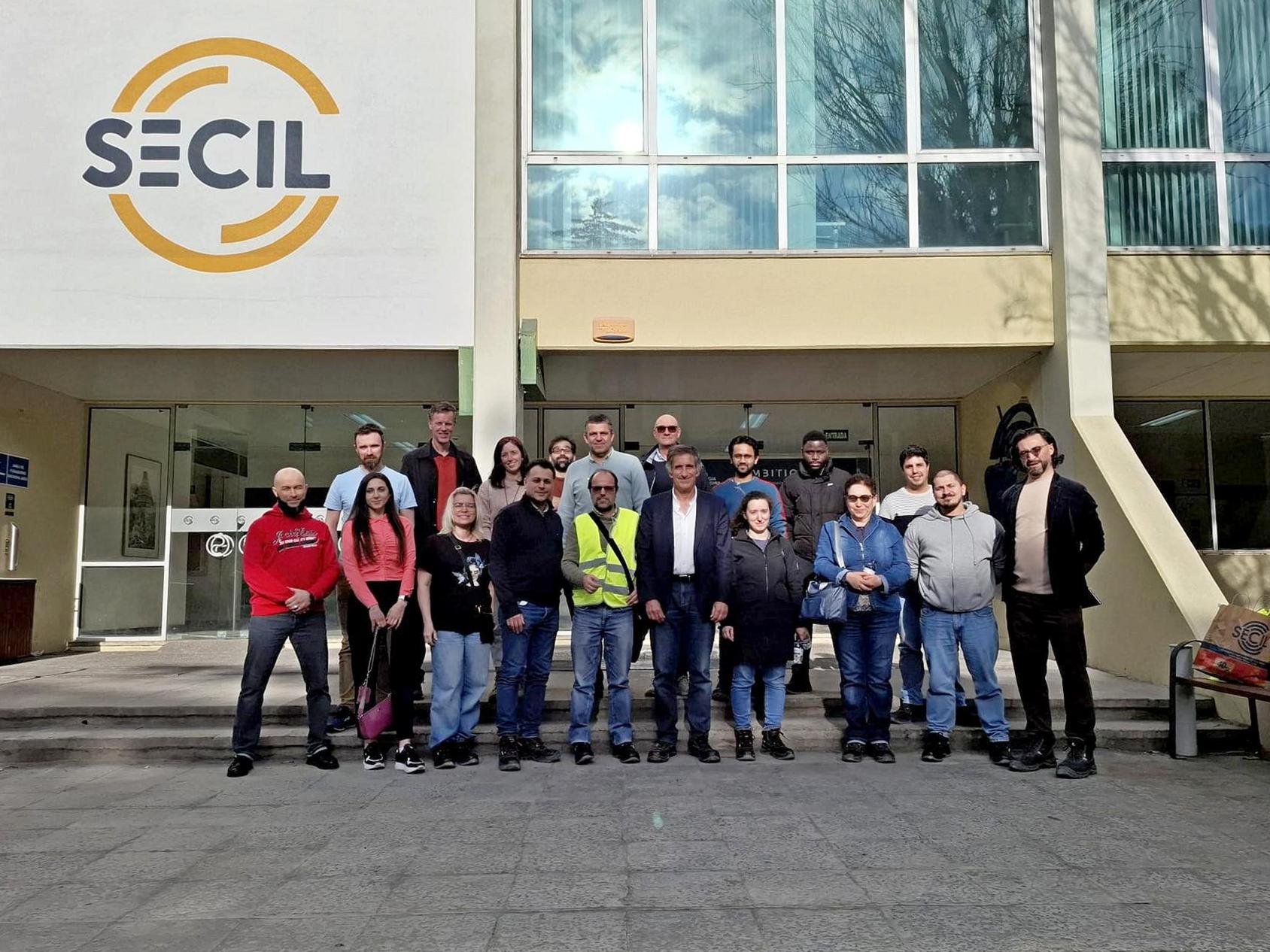 Group photo of attendees in front of SECIL building